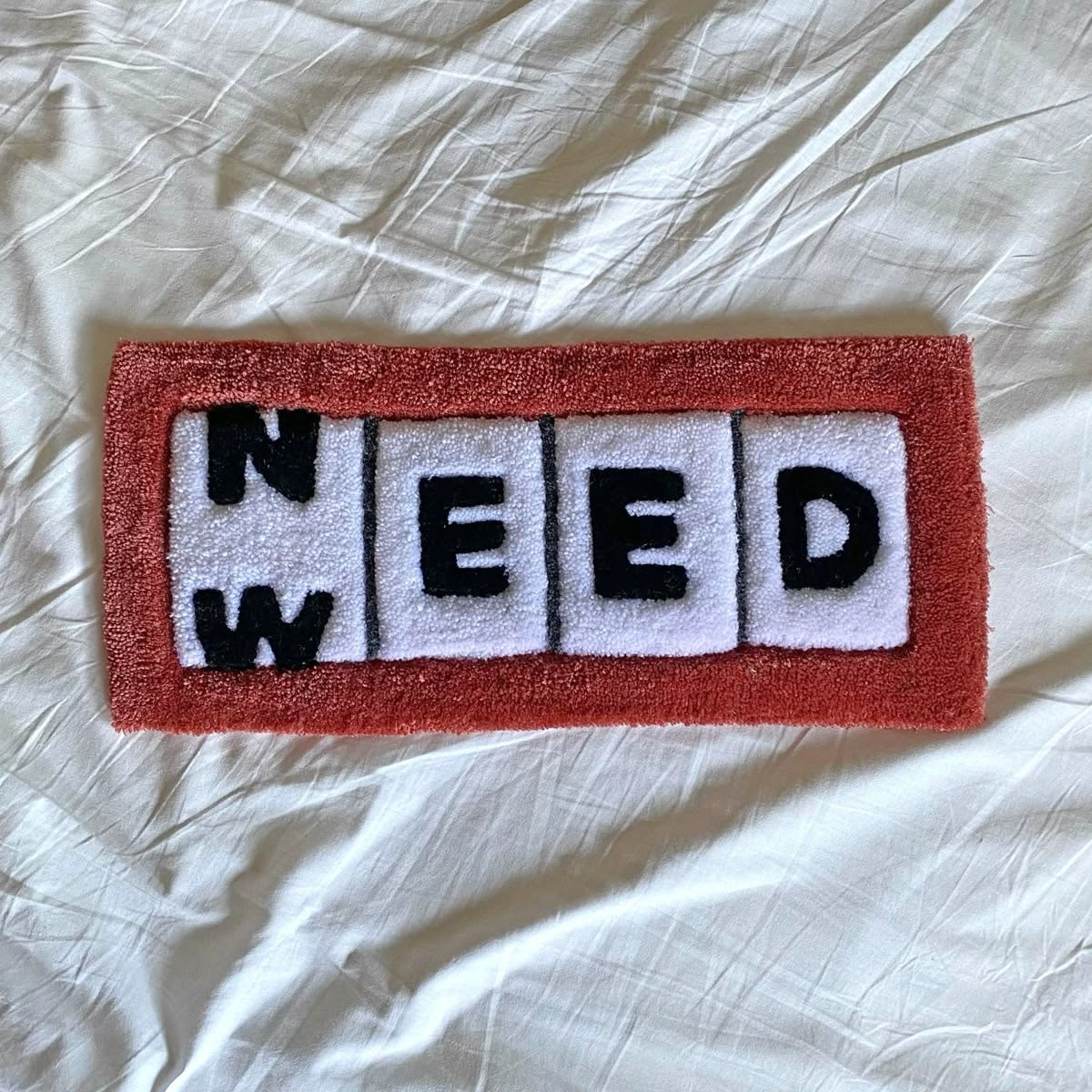 Need/Weed rug